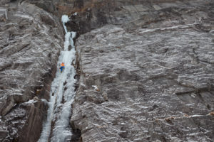 Climber doing ice climbing in Bodo, Nordland, Norway Climber doing ice climbing in Bodo, Nordland, Norway